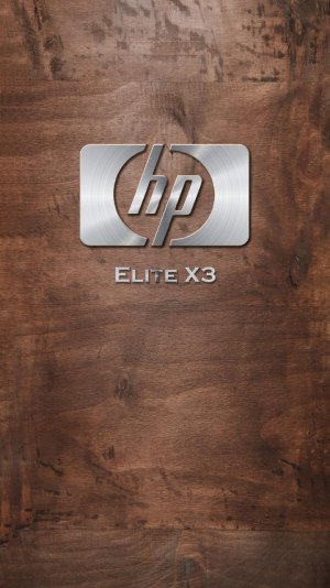 HP X3 metal logo wooden desk.jpg