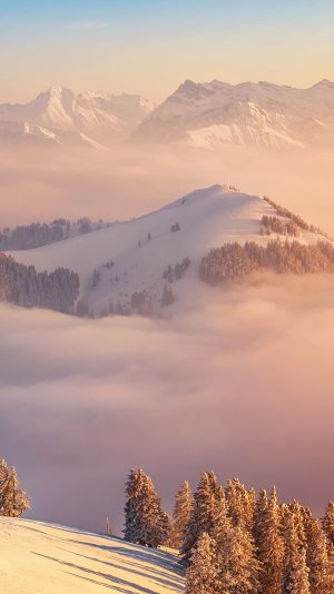 Mountains-clouds-winter-Switzerland_1080x1920_iPhone_6_Plus_wallpaper.jpg